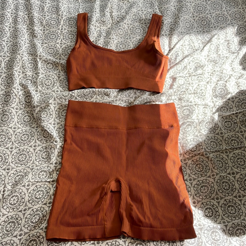 Ribbed rust colored sports bra and shorts set size small-medium